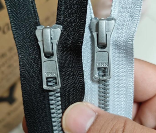 库存辅料回收公司，sbs拉链回收厂家，ykk拉链回收价格